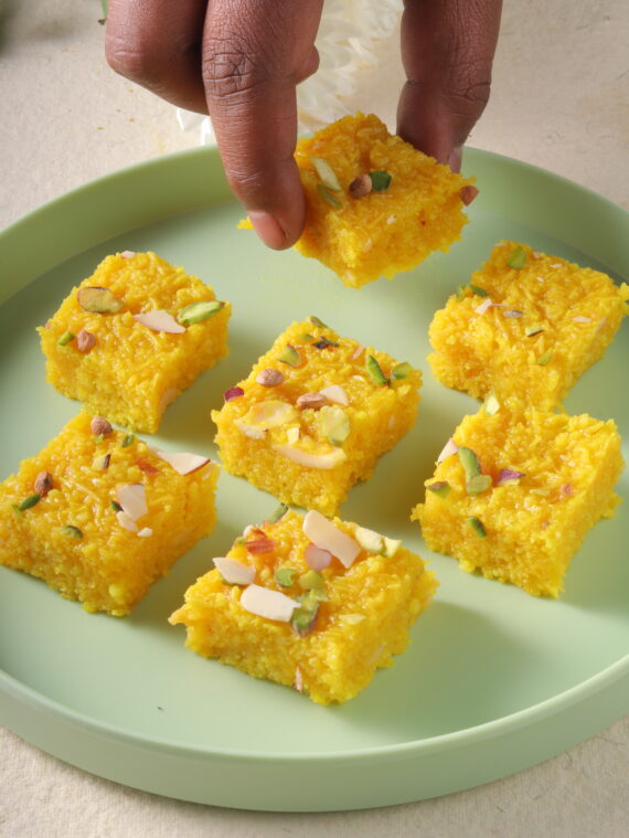 Encounter the delightful combination of textures and flavors with Sev Badam Burfi, where the crispiness of sev (thin noodles made from chickpea flour) meets the richness of almonds and khoya (reduced milk solids).