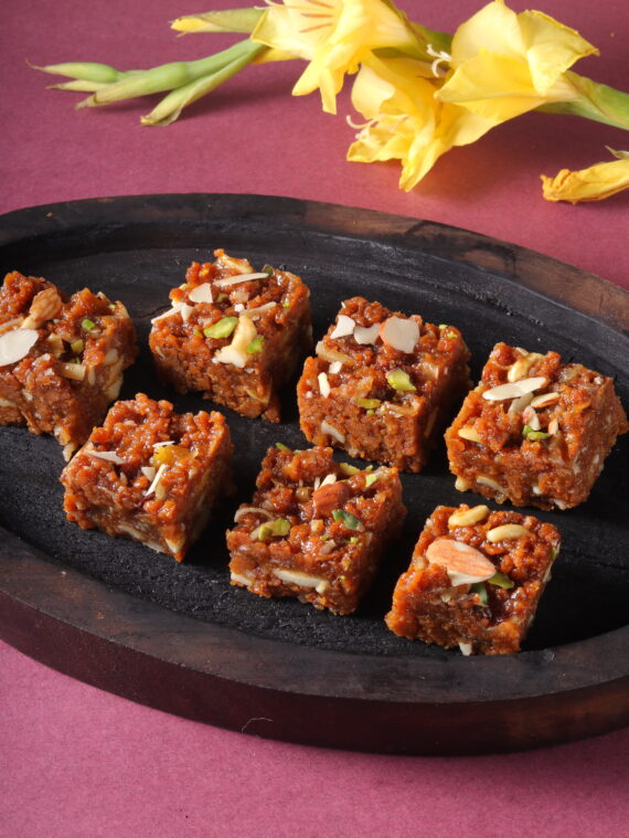 Doda Burfi delights with its rich texture and subtle sweetness, upgraded by the delicate smell of saffron and the crunch of nuts.