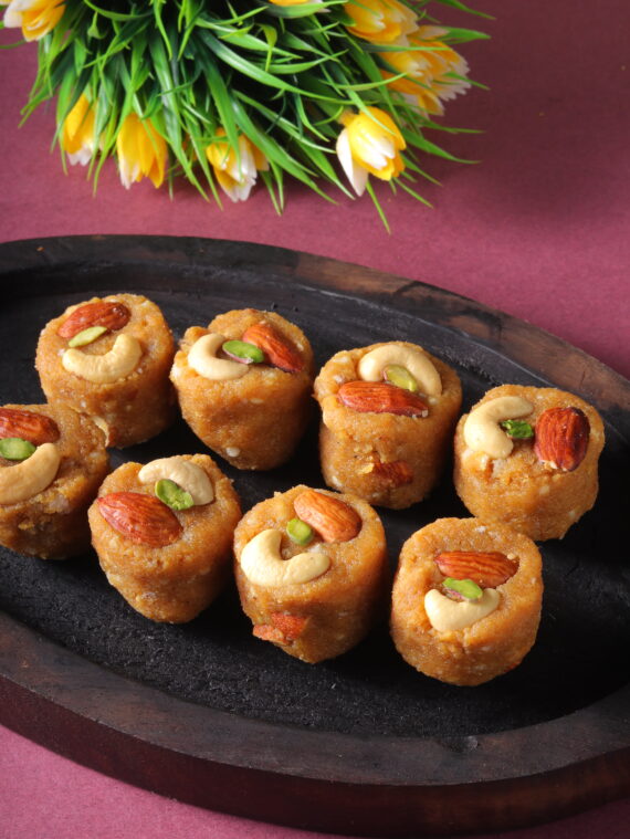 buy Special Dal Pinni, a cherished treat from Indian kitchens. This sweet delicacy combines lentils, ghee, jaggery, and nuts to create a rich, flavorful experience.