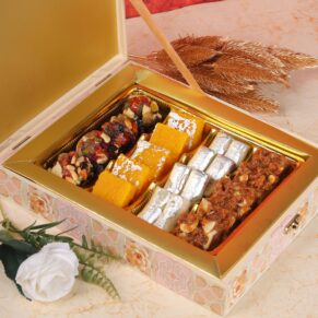 buy The Burfi Sweet Gift Box is a delightful and traditional way to celebrate special occasions and convey warm wishes. Burfi, a popular Indian sweet, is known for its rich, creamy texture and a variety of flavors. These gift boxes are perfect for festivals, weddings, anniversaries, and other celebratory events.